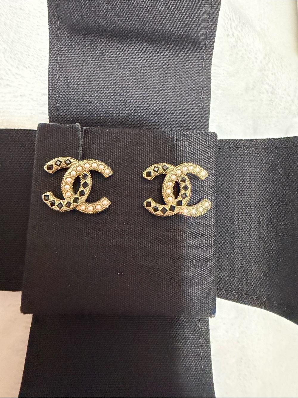CHANEL Gold-Tone CC Brooches with Black Enamel and Pearl Accents